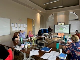 Teacher speaking to class