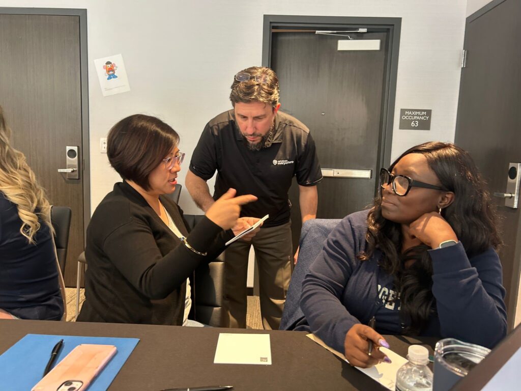 Instructor talking to student